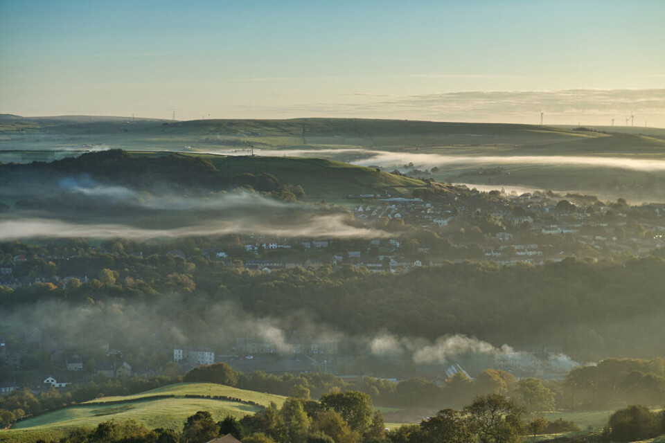 landscape picture of Rossendale valley with mist in valley bottom